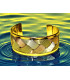 Bracelet en Cuivre tressé posé sur l'eau