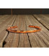 Bracelet en Cuivre Martelé posé sur bois