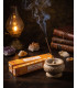 Encens Goloka Nag Champa - bâtonnet fumant sur son brule encens
